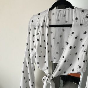 White bell sleeve crop top